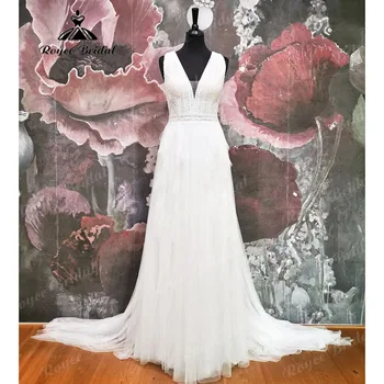 Дантелено Сватбена рокля на Принцеса впечатлява със своя Бохемски стил Бохо с дълбоко деколте за жени, Сватбена рокля с V-образно деколте 2023